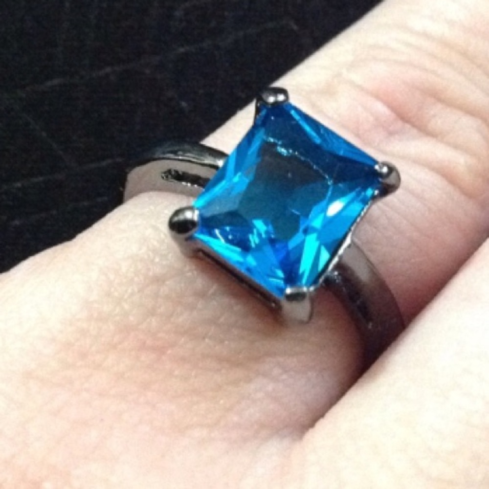 Radiant blue Aquamarine solitaire black gf ring